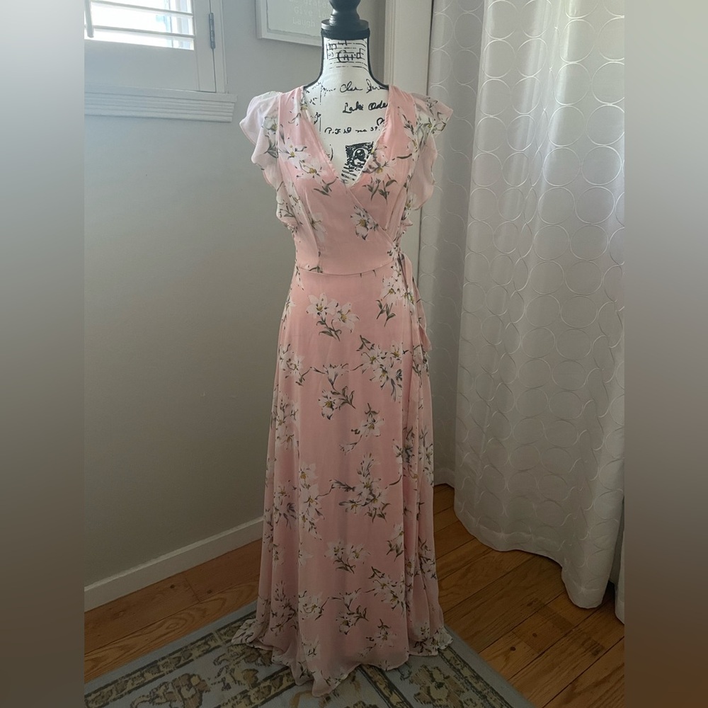 Long, flowy pink wrap dress